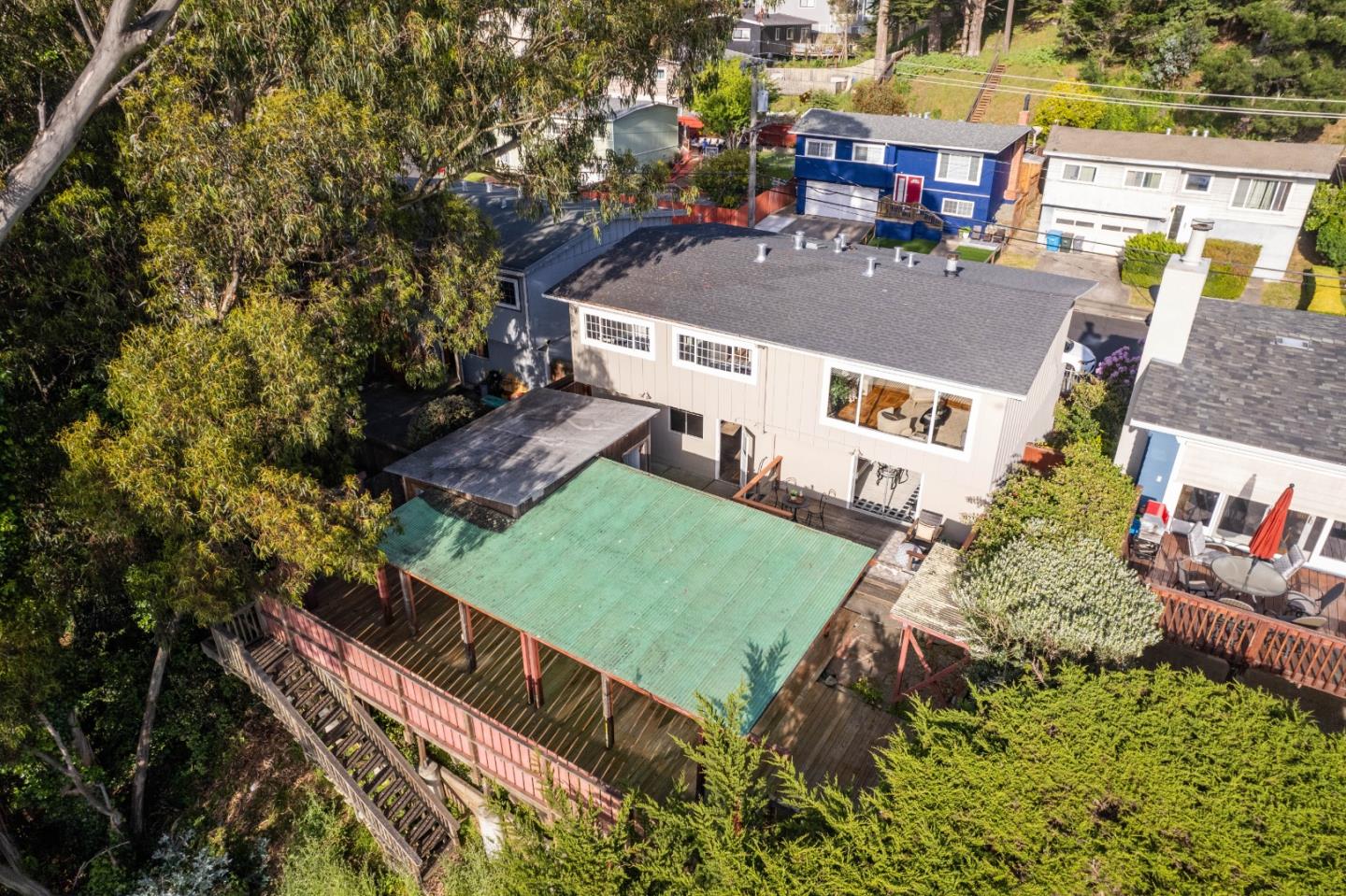 1212 Seville Drive Pacifica, CA 94044 - Photo 32 of 37 a aerial view of a house with swimming pool and porch