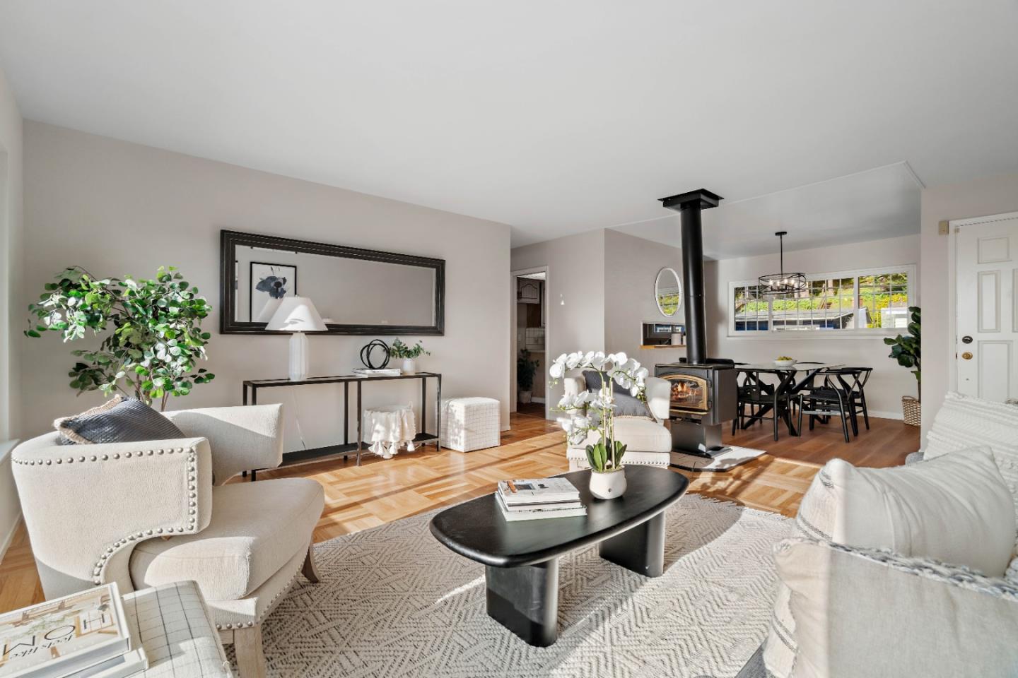 1212 Seville Drive Pacifica, CA 94044 - Photo 8 of 37 a living room with furniture and a flat screen tv