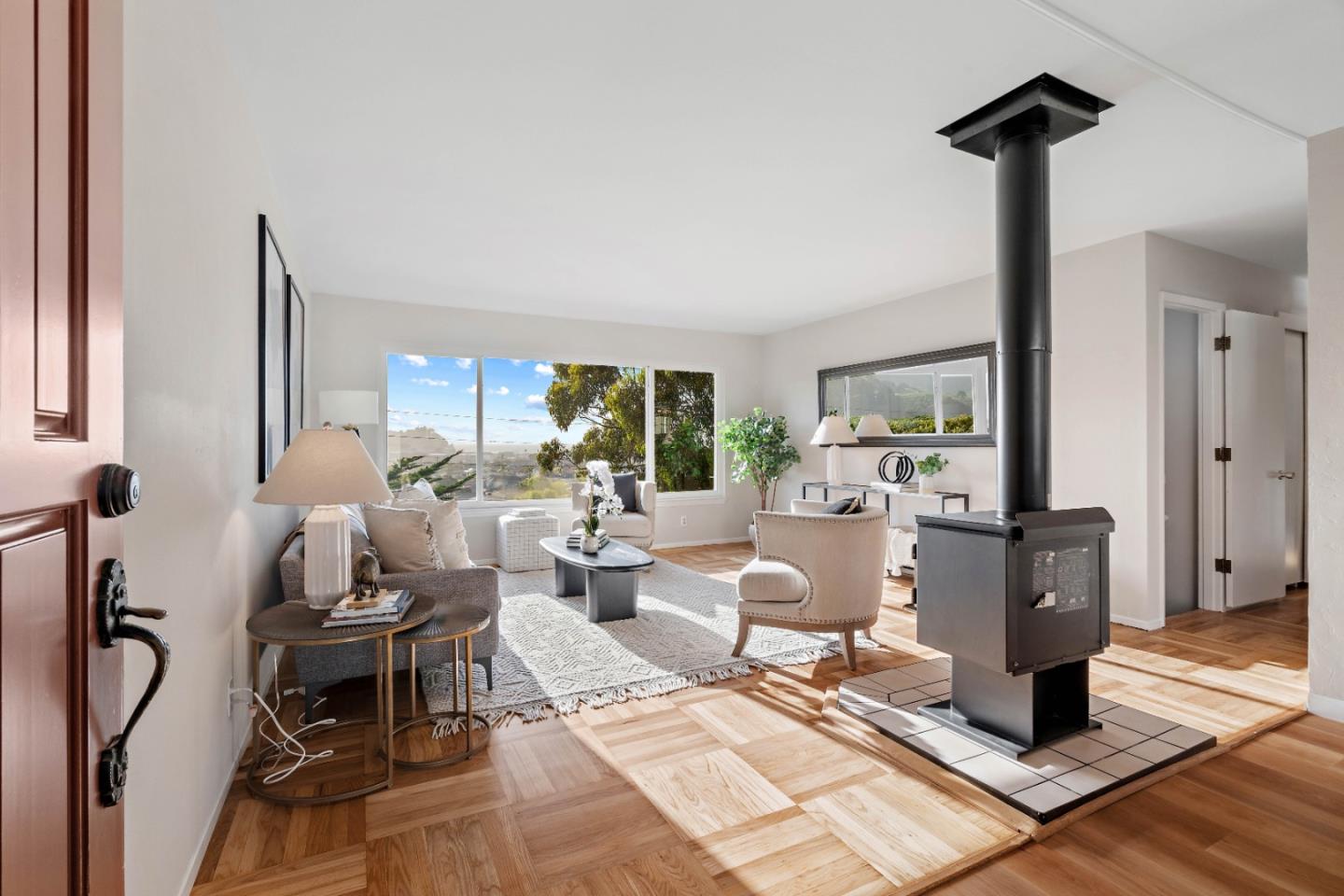 1212 Seville Drive Pacifica, CA 94044 - Photo 9 of 37 a living room with furniture and a table