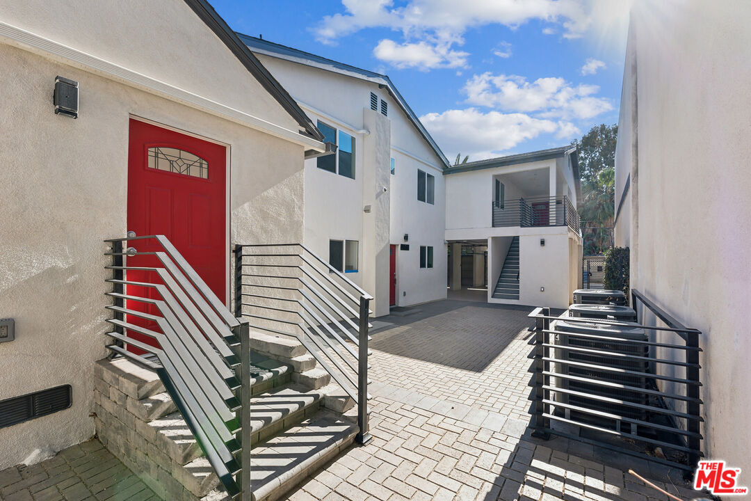 17610 Sherman Way, Unit 3 Van Nuys, CA 91406 - Photo 11 of 19 a view of entryway and hall with wooden floor