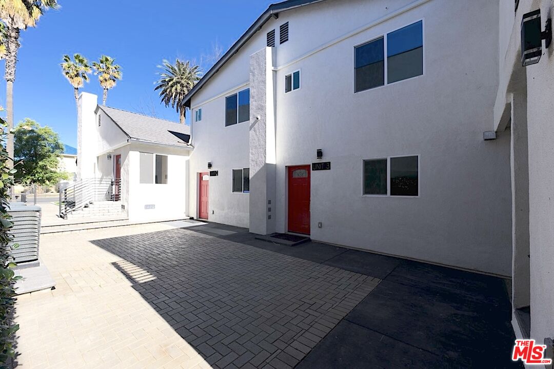 17610 Sherman Way, Unit 3 Van Nuys, CA 91406 - Photo 18 of 19 a view of a house with a street