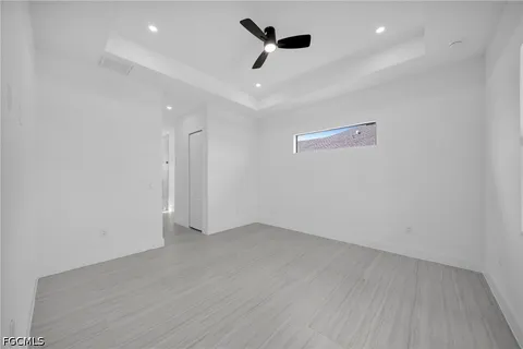 a view of hallway with wooden floor