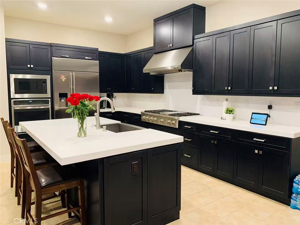 170 Scale Irvine, CA 92618 - Photo 2 of 9 a kitchen with a sink cabinets and wooden floor