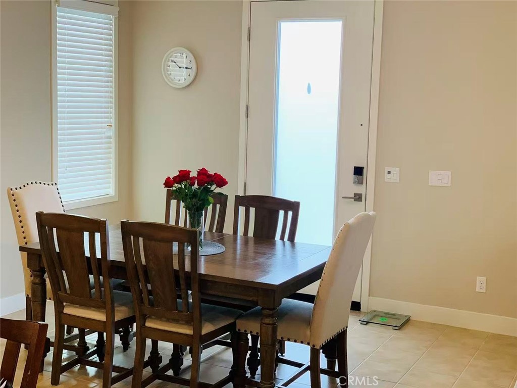 170 Scale Irvine, CA 92618 - Photo 4 of 9 a view of a dining room with furniture and window