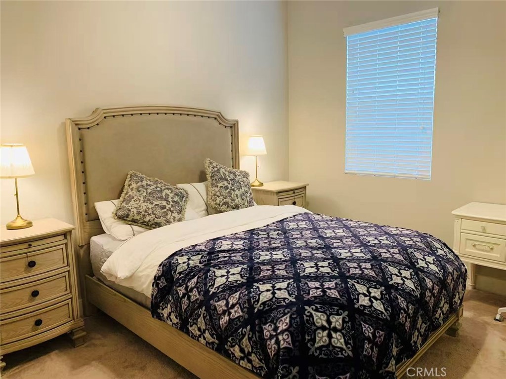 170 Scale Irvine, CA 92618 - Photo 5 of 9 a bedroom with a bed and closet