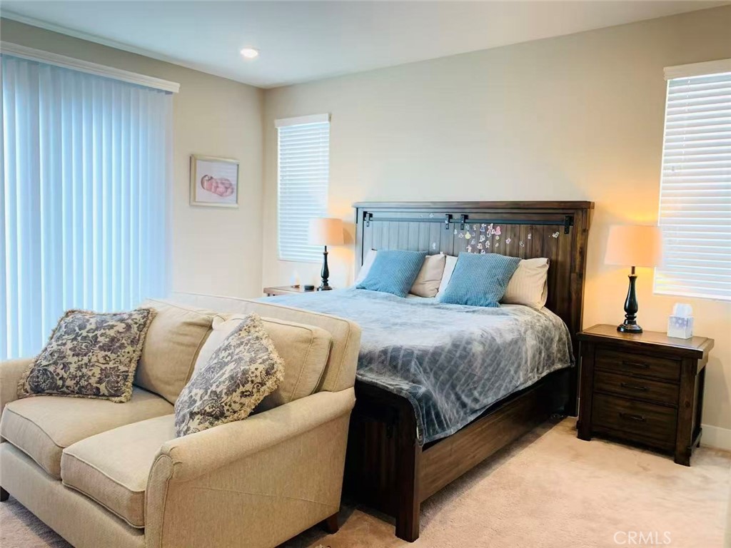 170 Scale Irvine, CA 92618 - Photo 6 of 9 a bedroom with a bed couch and window