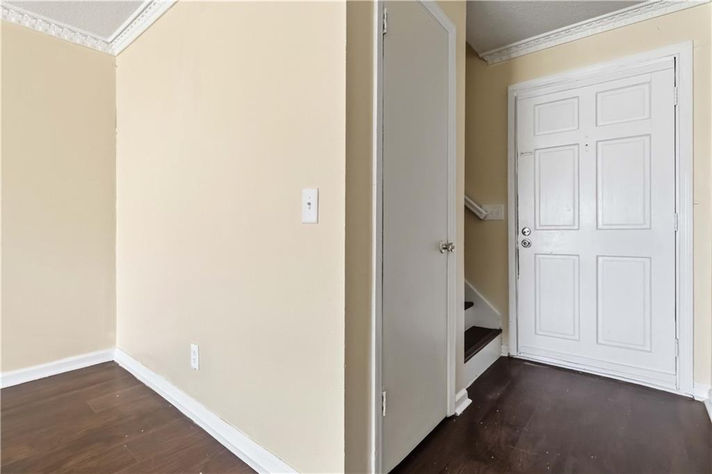 119 Plantation Circle Clarkston, GA 30021 - Photo 3 of 25 a view of a hallway with closet