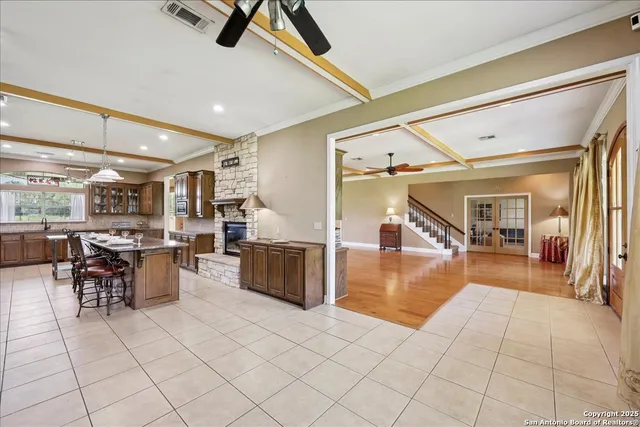 a lobby with furniture and view of dining room