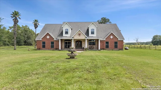 a view of house with garden