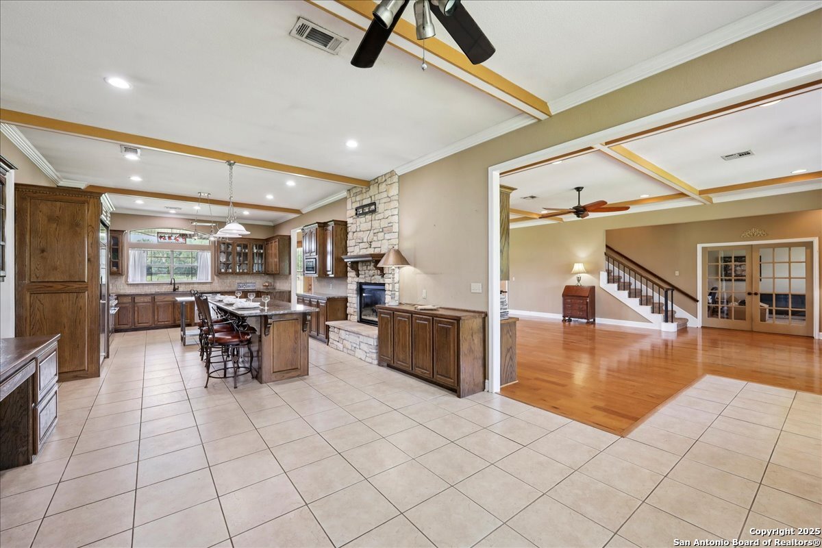 6900 Meyers Road Orange, TX 77632 - Photo 21 of 49 a view of a dining hall with lots of furniture and a chandelier