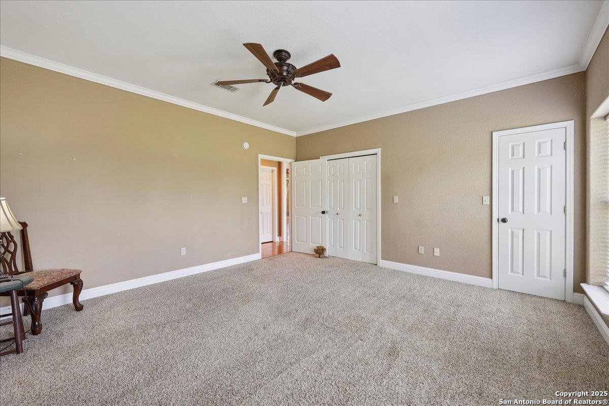 6900 Meyers Road Orange, TX 77632 - Photo 37 of 49 a view of a livingroom with a ceiling fan and window