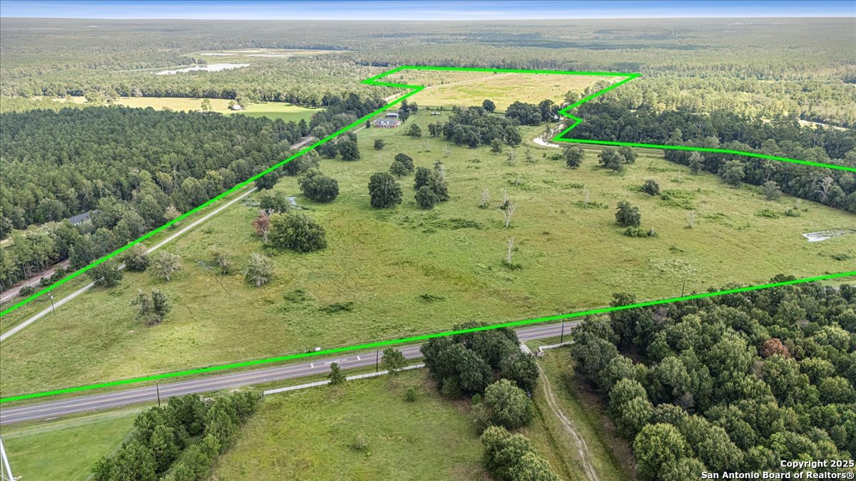 6900 Meyers Road Orange, TX 77632 - Photo 6 of 49 a view of a field with an ocean