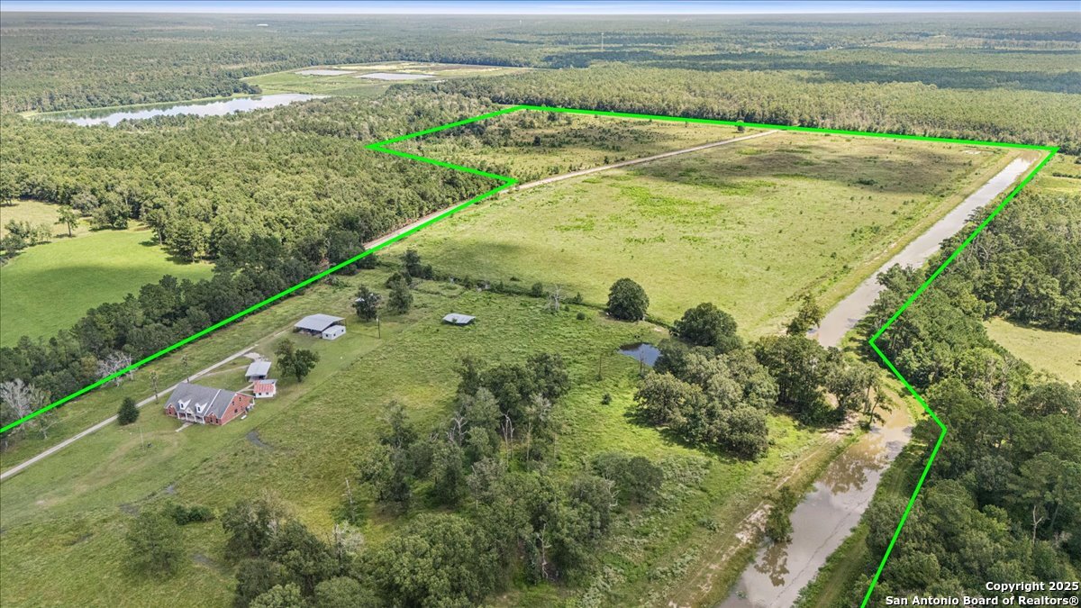 6900 Meyers Road Orange, TX 77632 - Photo 10 of 49 a view of a field with an ocean