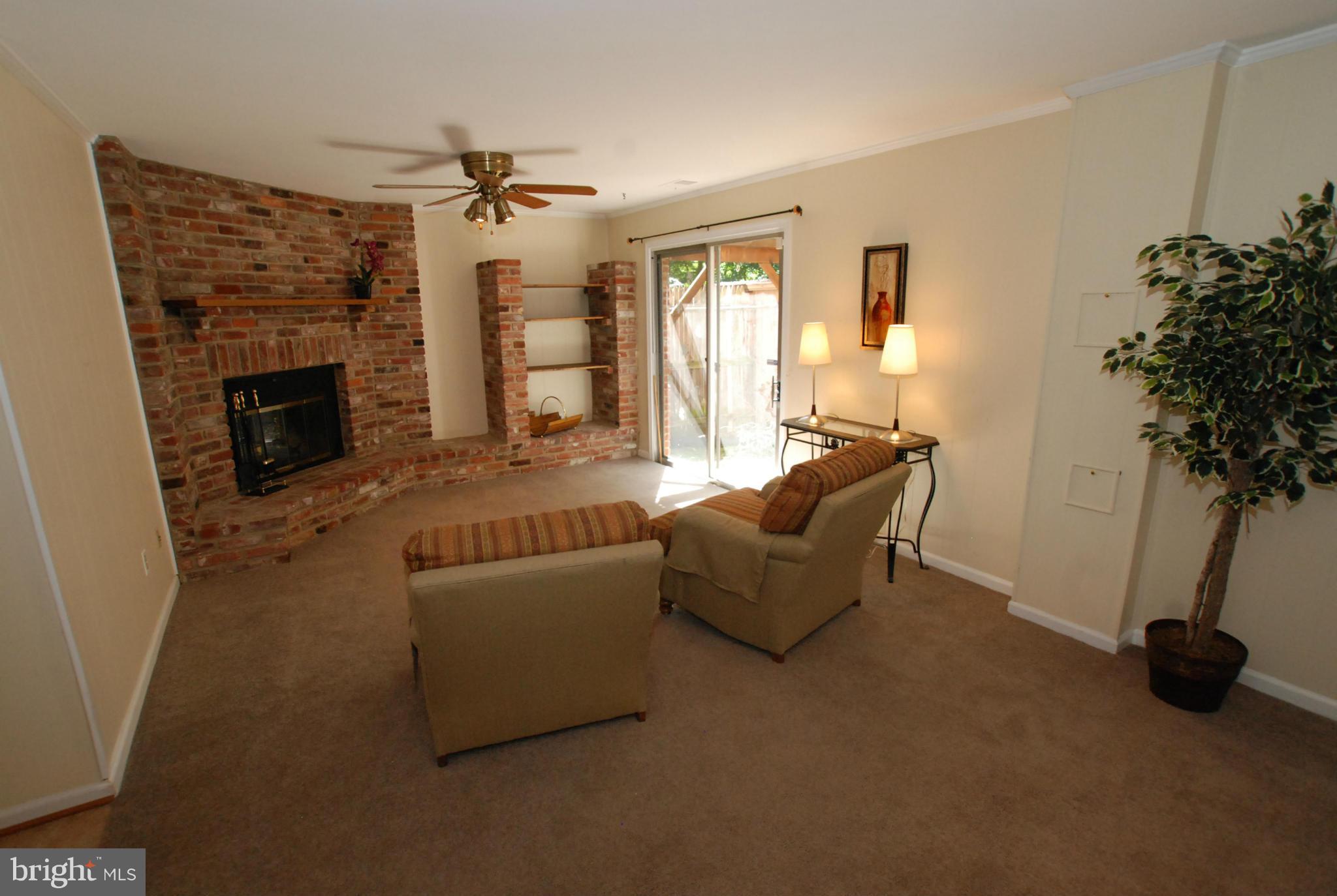 6042 Haverhill Court Springfield, VA 22152 - Photo 20 of 24 Recreation Room with wood burning fireplace