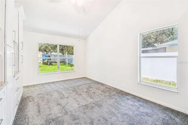 a kitchen with granite countertop a sink and a granite counter tops