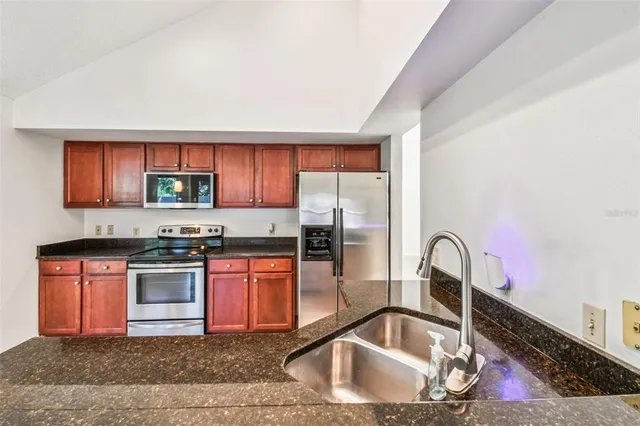 a view of bathroom with a sink and toilet