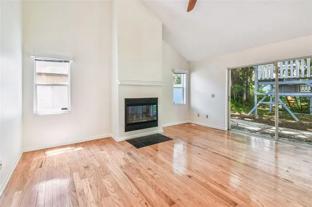 a view of a chandelier fan in a room
