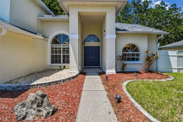 a view of empty room with floor to ceiling window