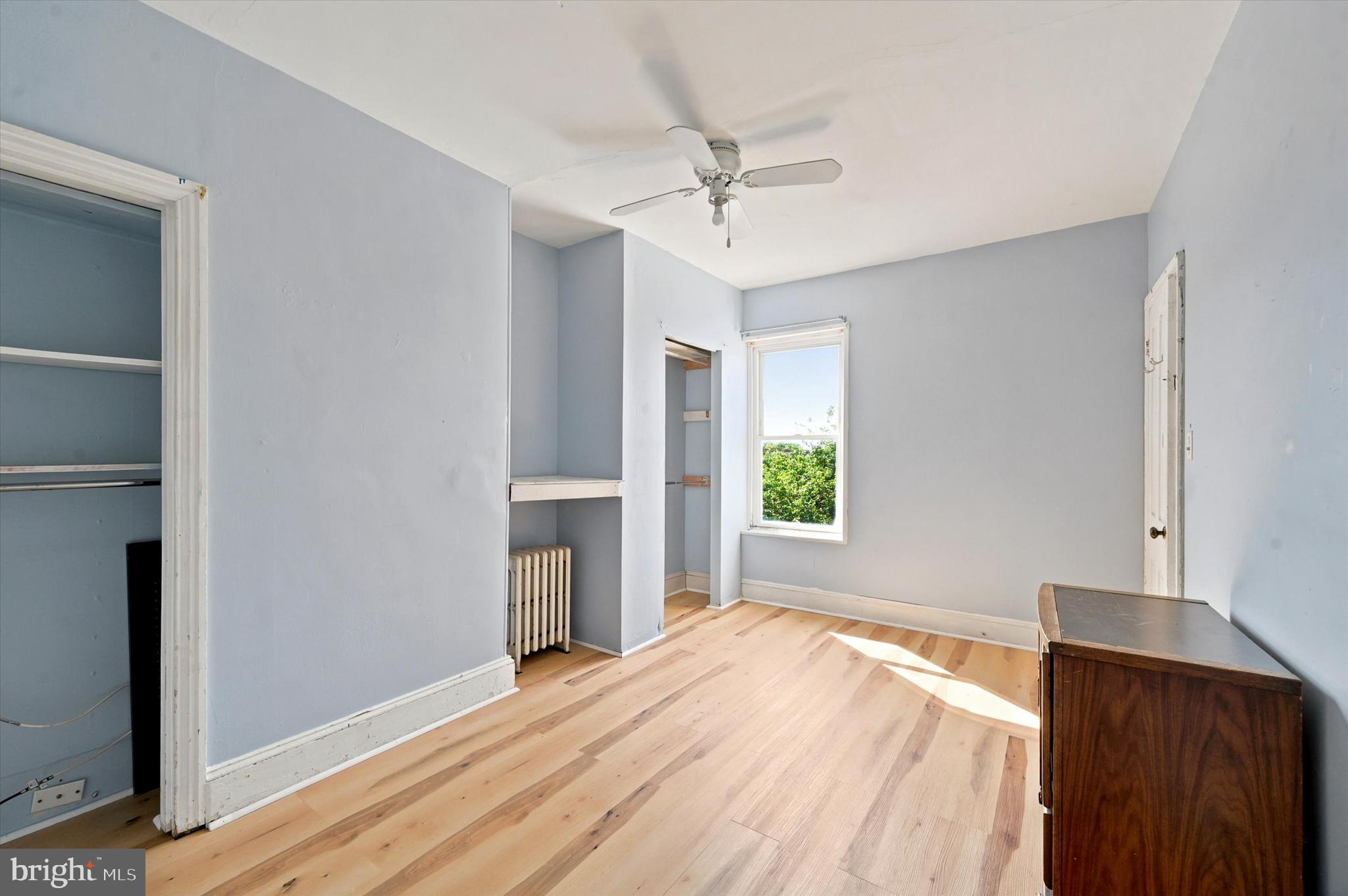 204 Ripka Street, Unit 2 Philadelphia, PA 19127 - Photo 12 of 22 a view of empty room with wooden floor and fan