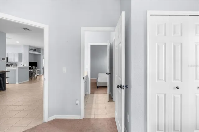a view of entryway with livingroom and kitchen view