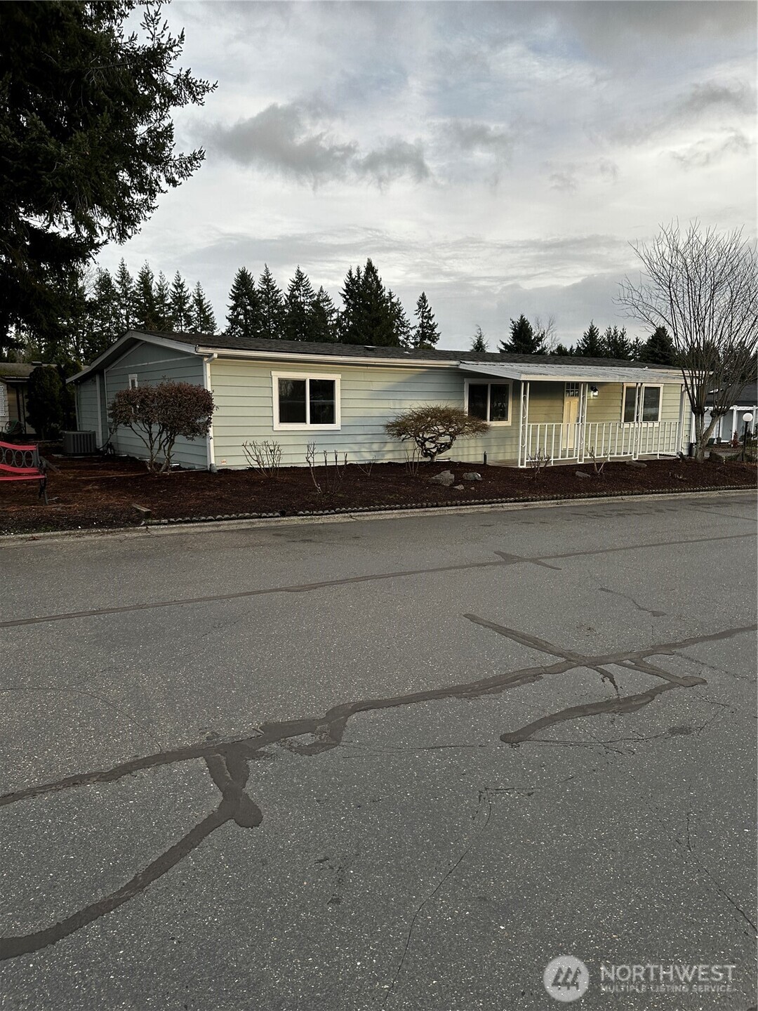 201 Union Avenue Southeast, Unit 249 Renton, WA 98059 - Photo 12 of 15 a front view of a house with a yard