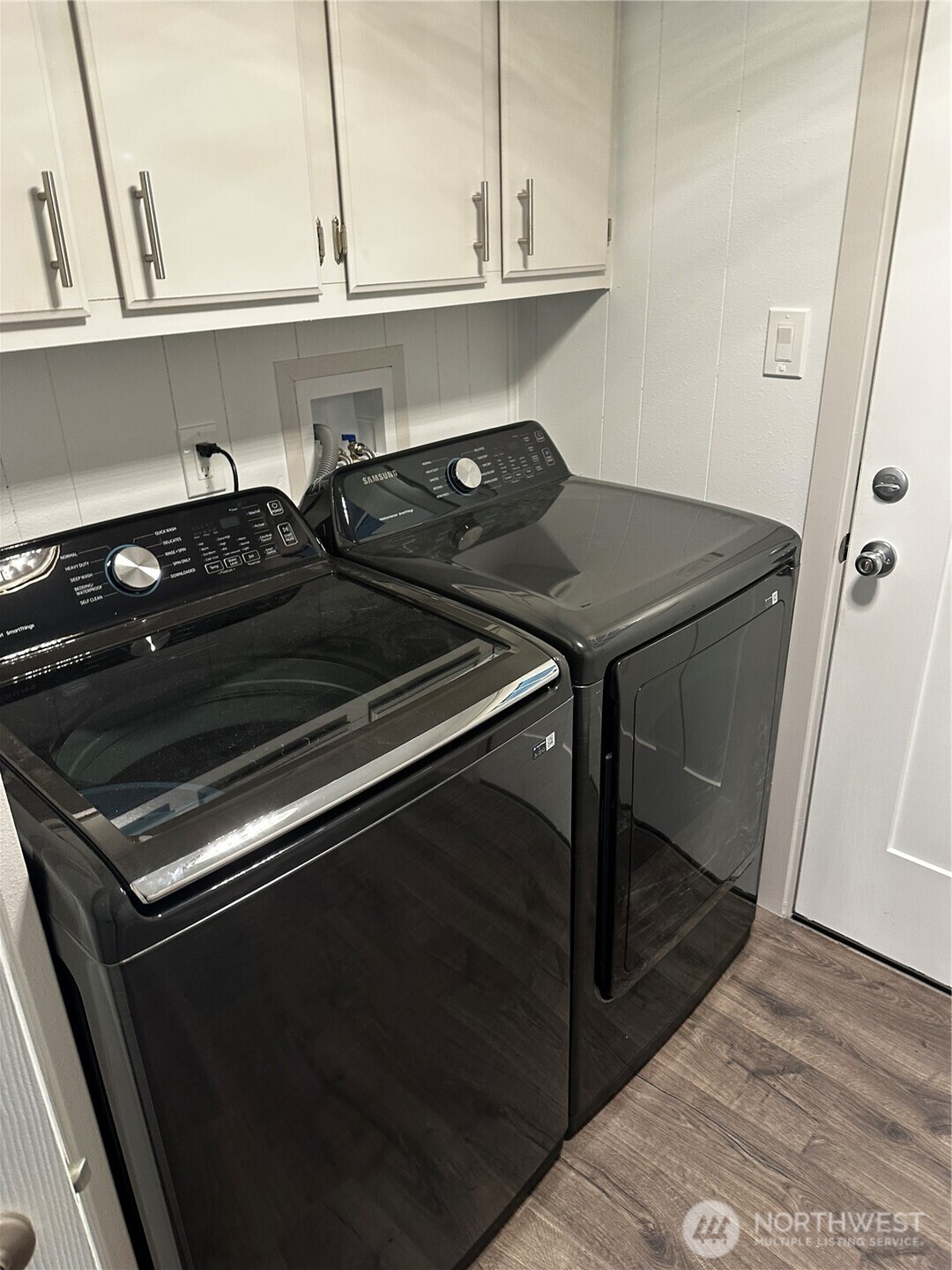 201 Union Avenue Southeast, Unit 249 Renton, WA 98059 - Photo 9 of 15 a stove top oven sitting inside of a kitchen