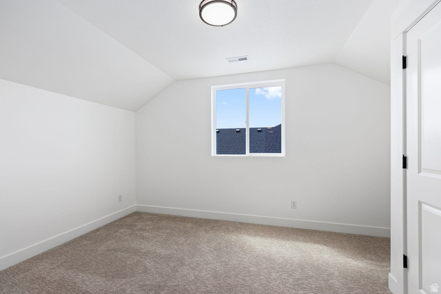 1144 South 4475 West West Point, UT 84015 - Photo 21 of 30 Bright interior space featuring a single pane window, white trim, and a low-pile carpet
