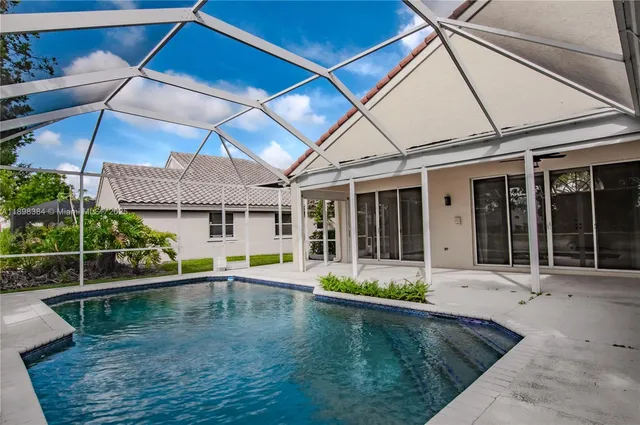 a view of a house with swimming pool