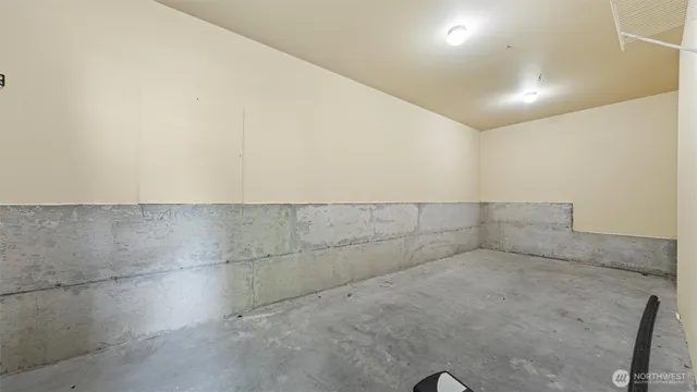 a view of a lake with houses in the back