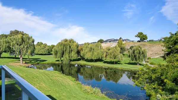 a view of a lake with a big yard