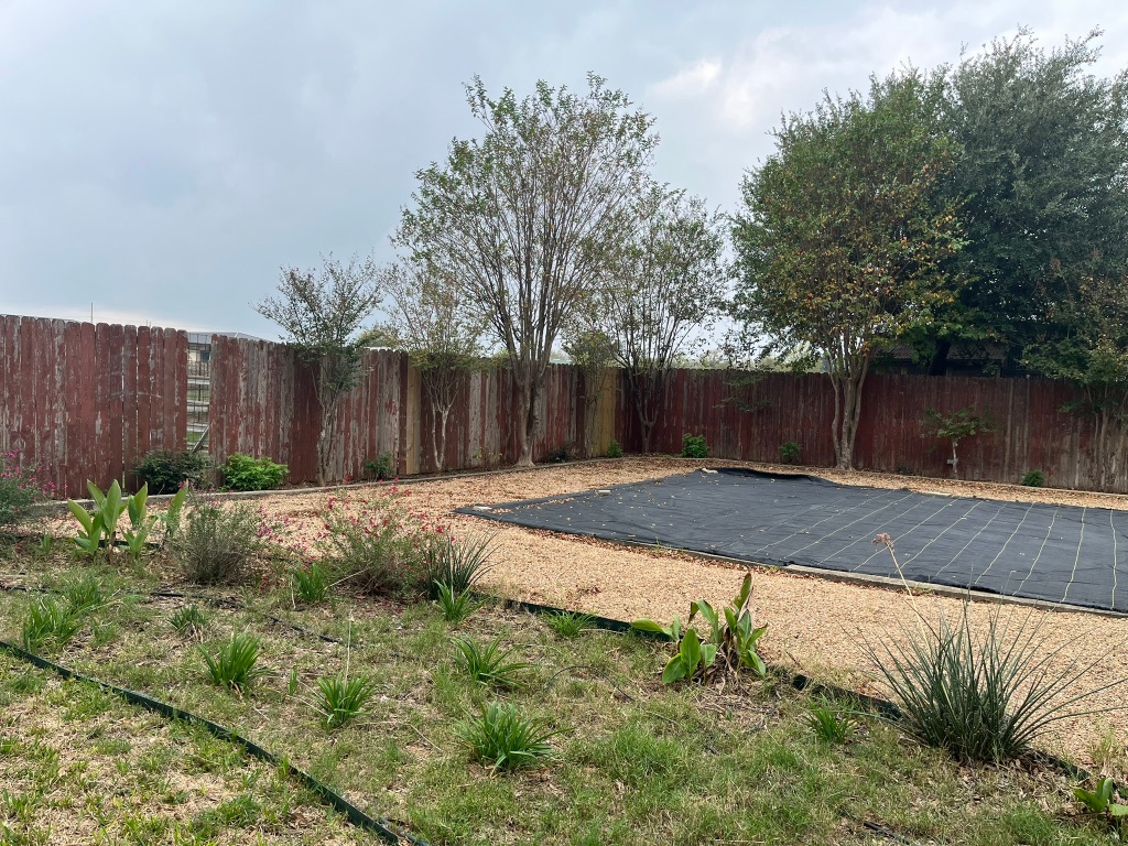 670 Farm To Market 1626 Buda, TX 78610 - Photo 5 of 15 a view of a backyard