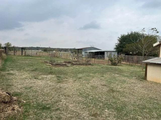 a house view with a garden space