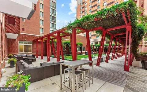 a view of outdoor dining space with a patio