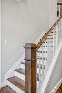 a view of a hallway with windows