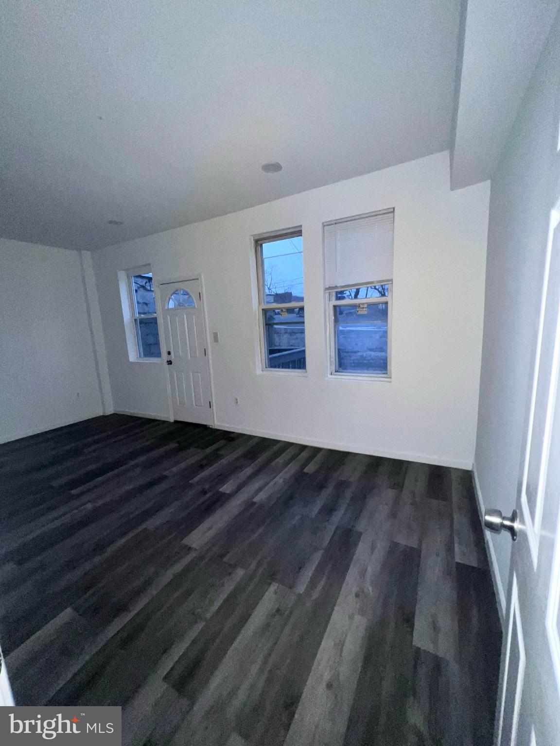 7034 North Broad Street Philadelphia, PA 19126 - Photo 11 of 13 wooden floor in an empty room