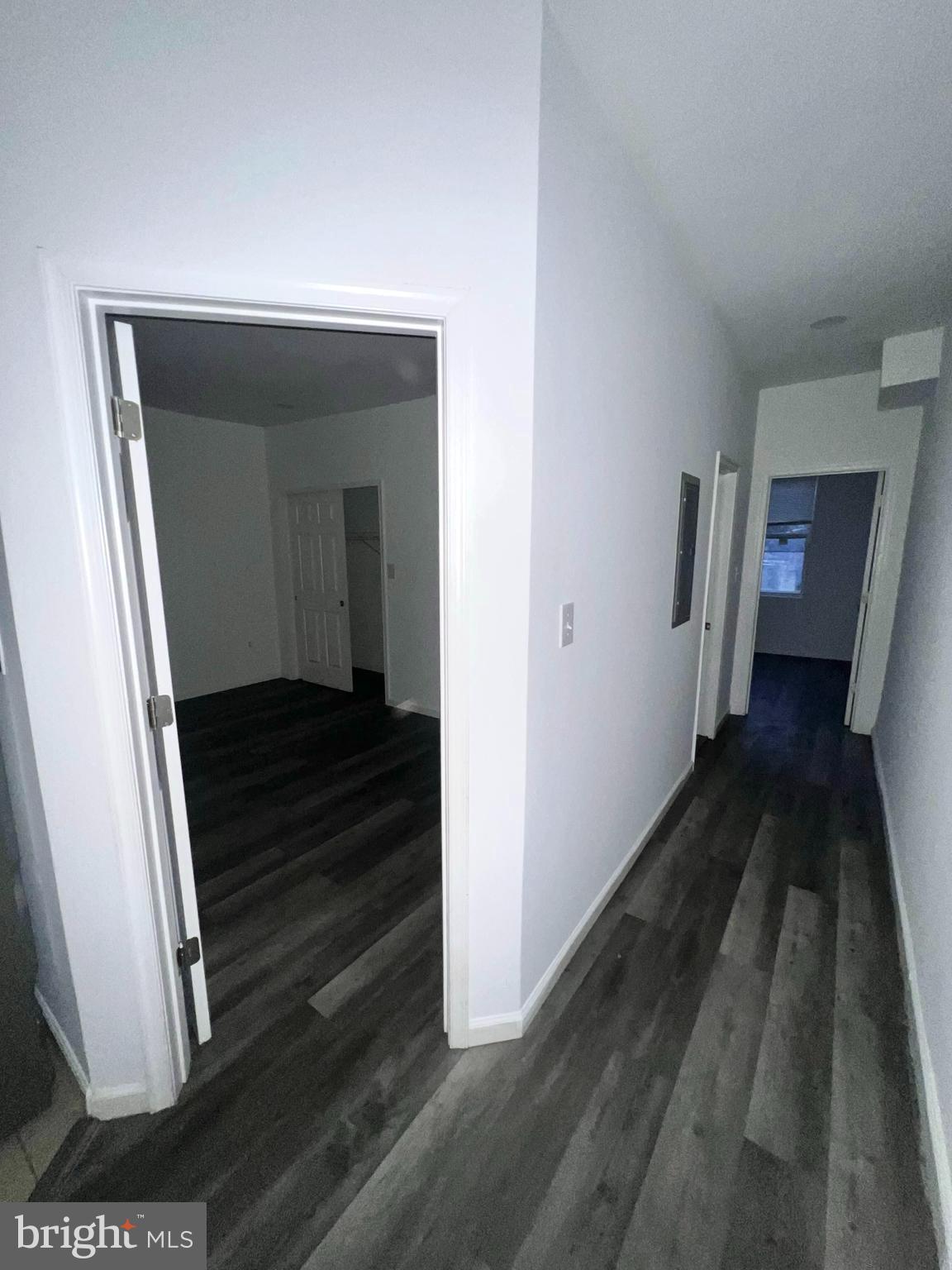 7034 North Broad Street Philadelphia, PA 19126 - Photo 7 of 13 a view of a hallway view with wooden floor and staircase