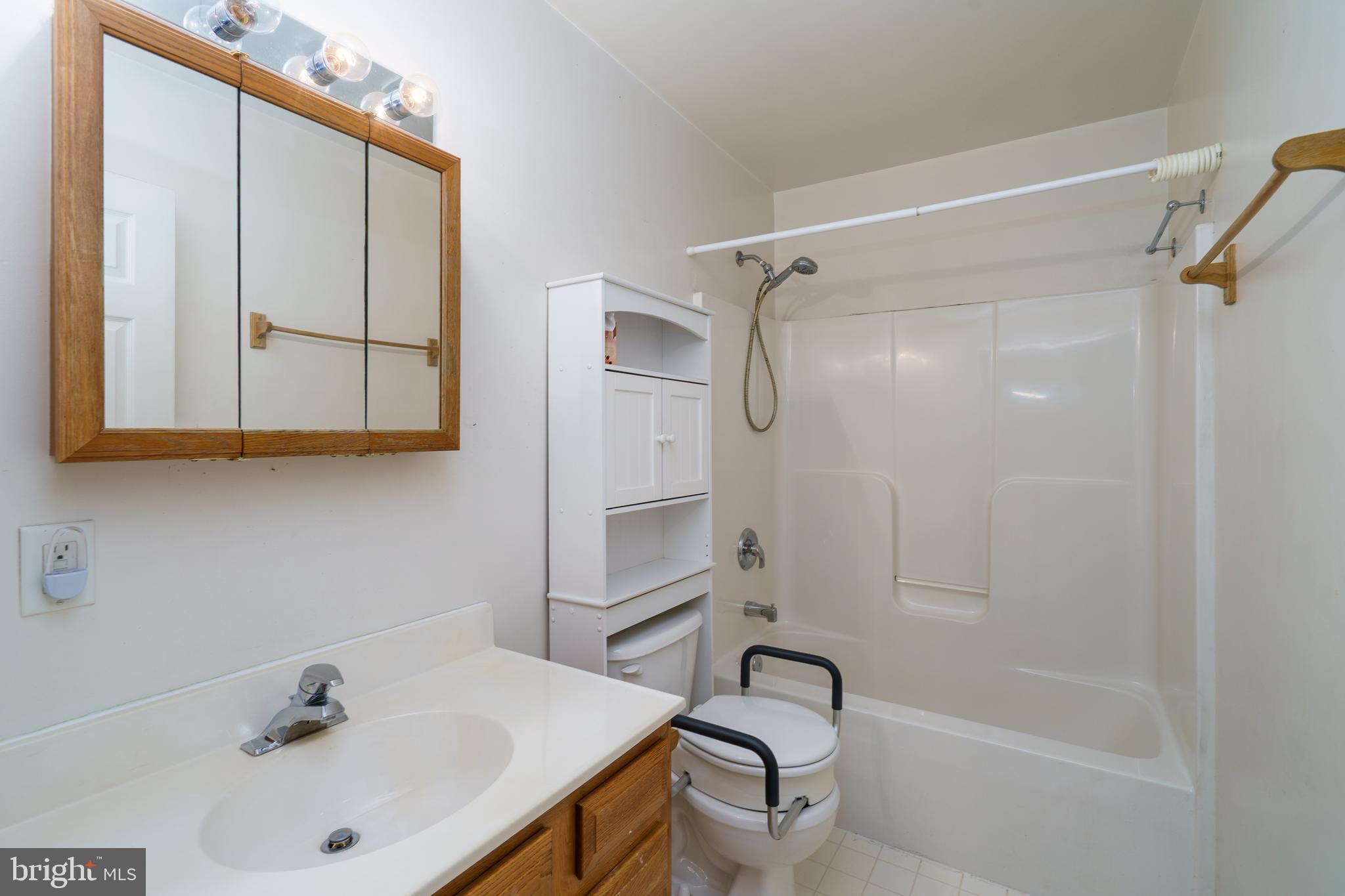 112 Brin Drive Ranson, WV 25438 - Photo 18 of 26 a bathroom with a sink and a tub