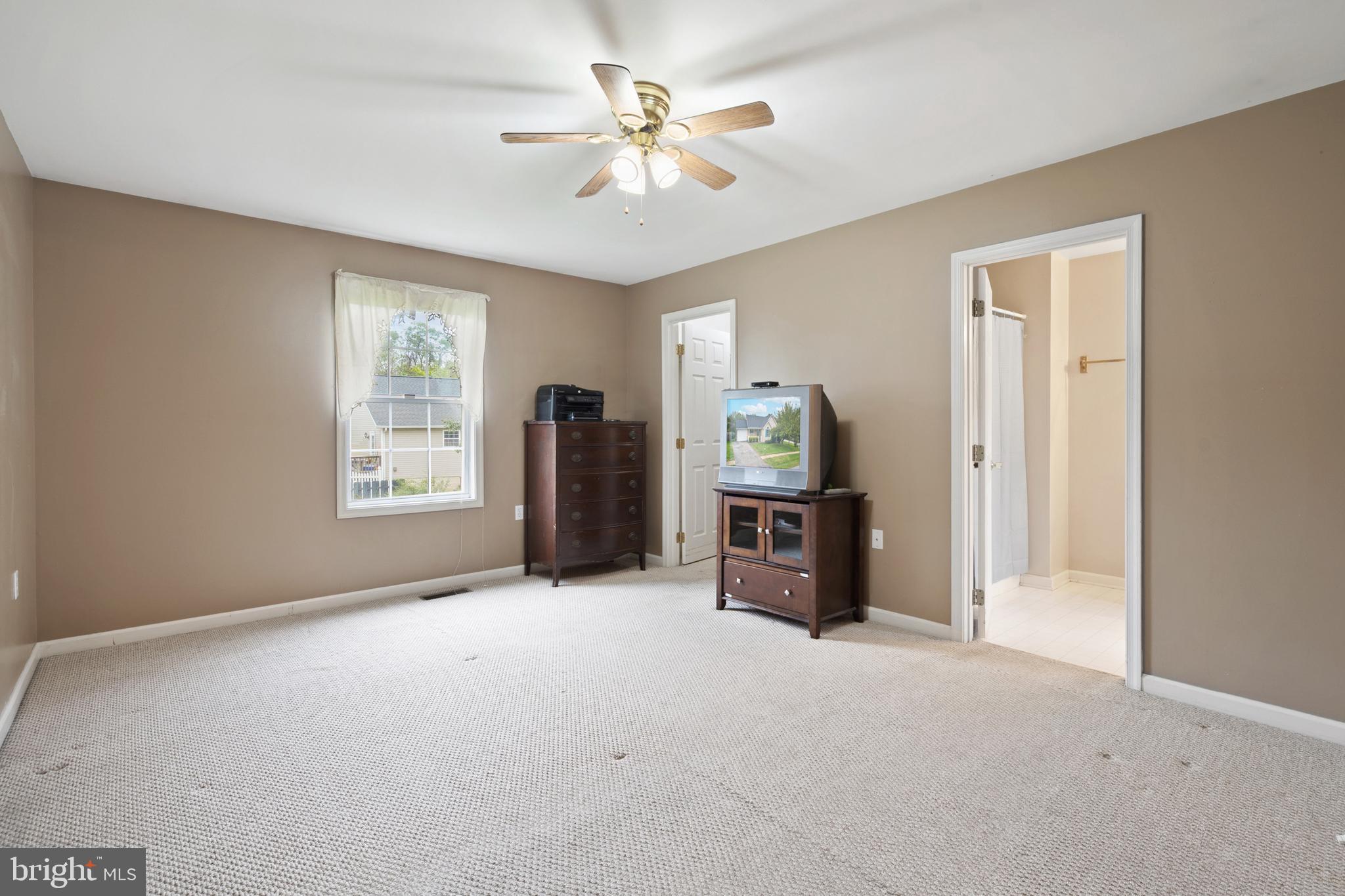 112 Brin Drive Ranson, WV 25438 - Photo 19 of 26 an empty room with windows and closet