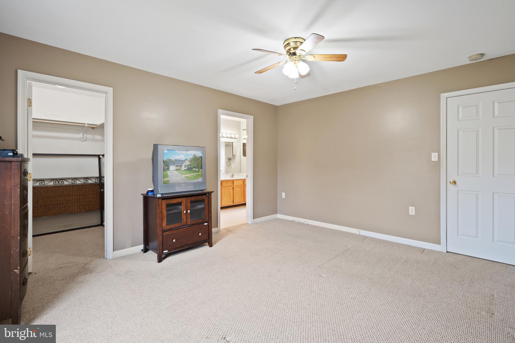 112 Brin Drive Ranson, WV 25438 - Photo 20 of 26 an empty room with closet and windows