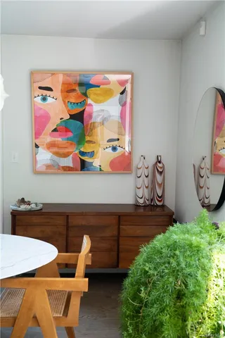 a view of a dining room with furniture window and outside view