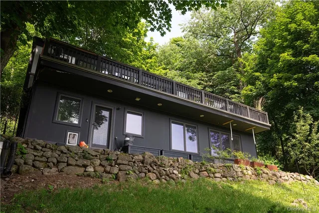 a view of swimming pool with outdoor seating