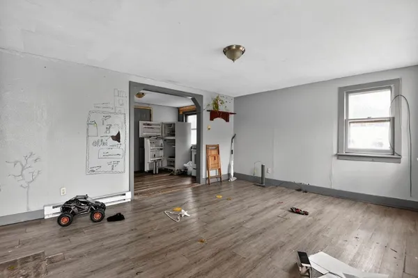a view of a livingroom with wooden floor