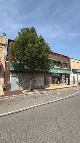 a view of a building with a street