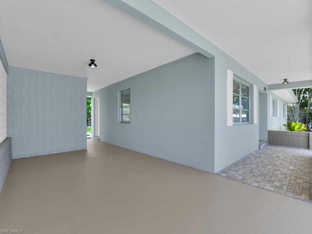 1958 41st Terrace Southwest Naples, FL 34116 - Photo 9 of 28 a view of an empty room with a window