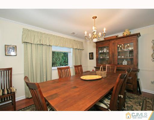 15 King Road Somerset, NJ 08873 - Photo 3 of 8 a view of a dining room with furniture and window