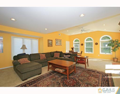 15 King Road Somerset, NJ 08873 - Photo 5 of 8 a living room with furniture and a large window