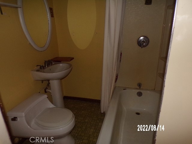 13425 Jensen Road Clearlake Oaks, CA 95423 - Photo 11 of 14 a bathroom with a toilet
