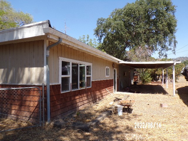 13425 Jensen Road Clearlake Oaks, CA 95423 - Photo 2 of 14 a view of house with snow on the road