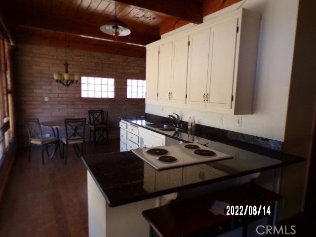 13425 Jensen Road Clearlake Oaks, CA 95423 - Photo 9 of 14 a view of kitchen island with appliances
