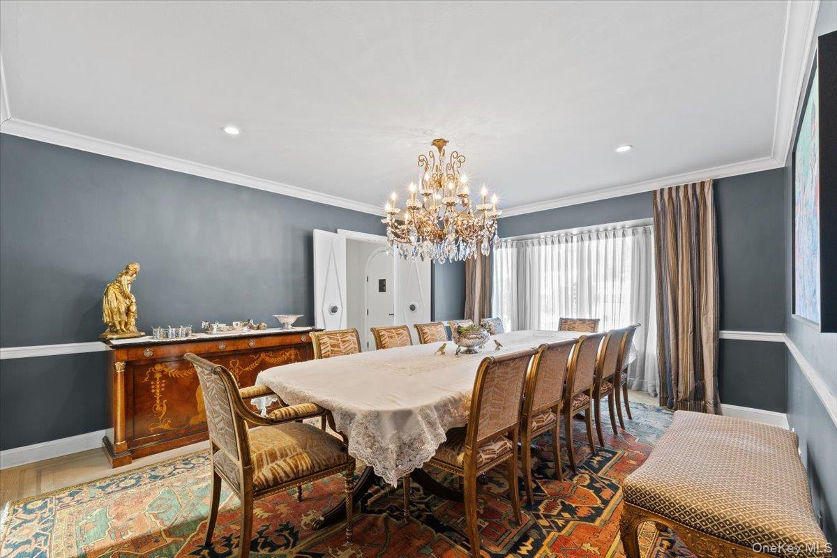 25 Pond Park Road Great Neck, NY 11023 - Photo 14 of 45 a view of a dining room with furniture and window